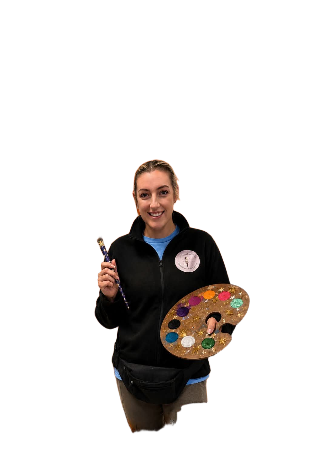 Gemma smiling, holding a star-decorated paint palette and a sparkly brush